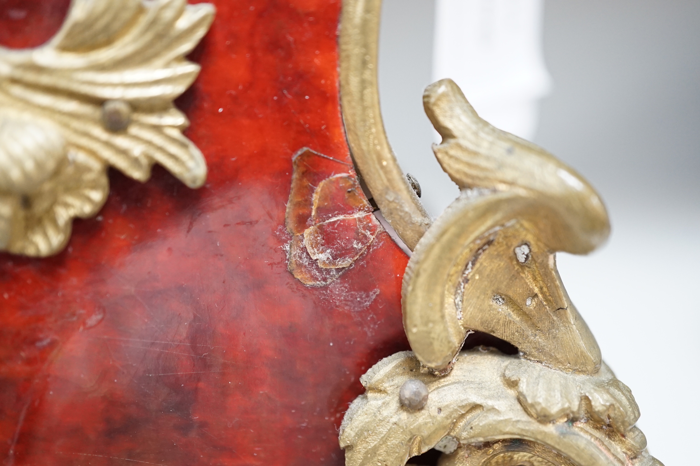 An early 20th century French tortoiseshell mantel clock with dragon mount, 30cm